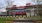 a building with a red and white sign