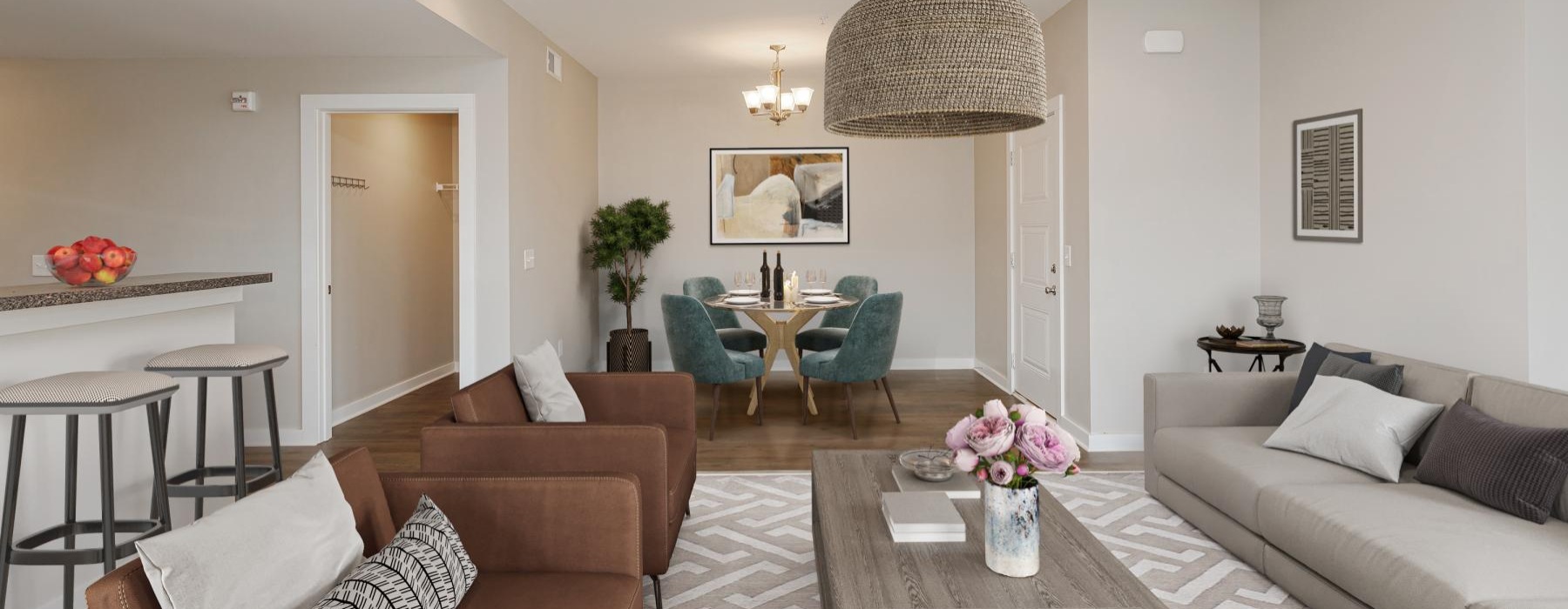 a living room with a chandelier and couches