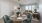 a dining room table with plates and glasses on it