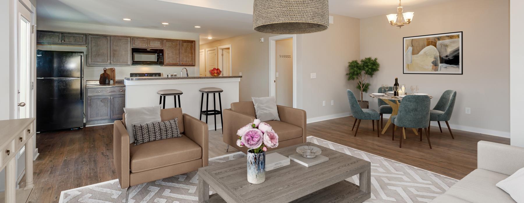 a large living room with a chandelier and a dining table